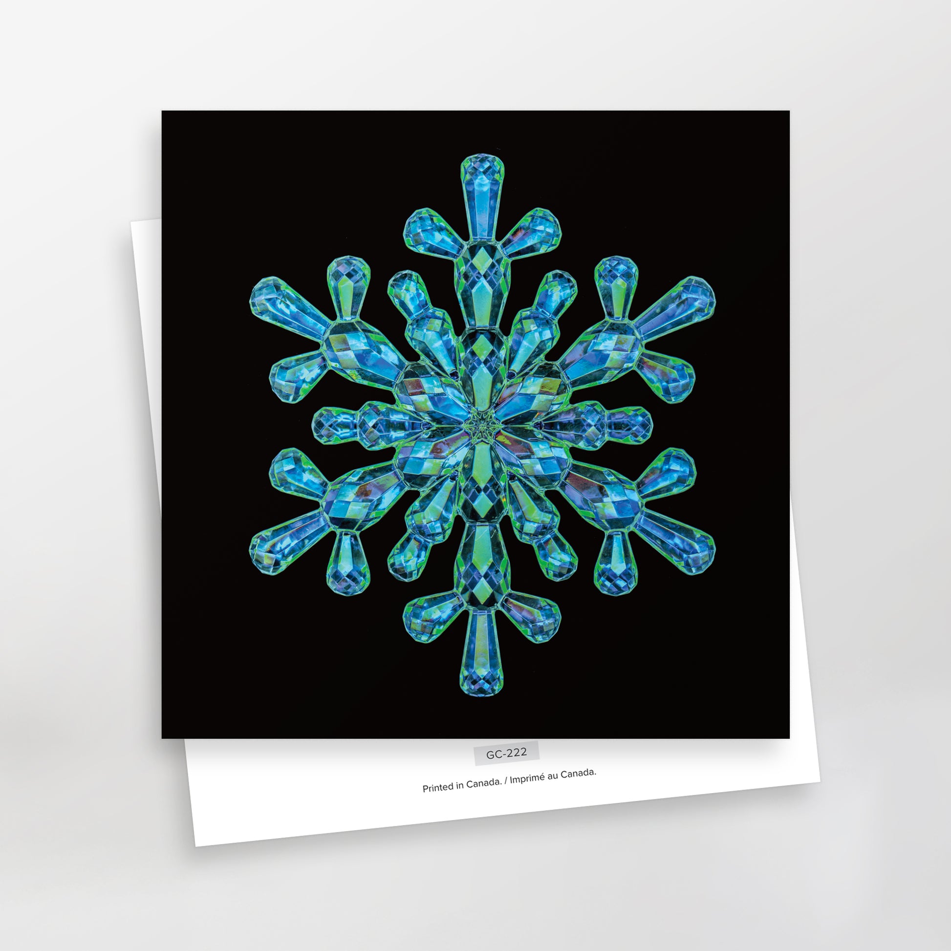 sparkles greeting card series, sapphire snowflake on black background gc-222 by carmen grenier