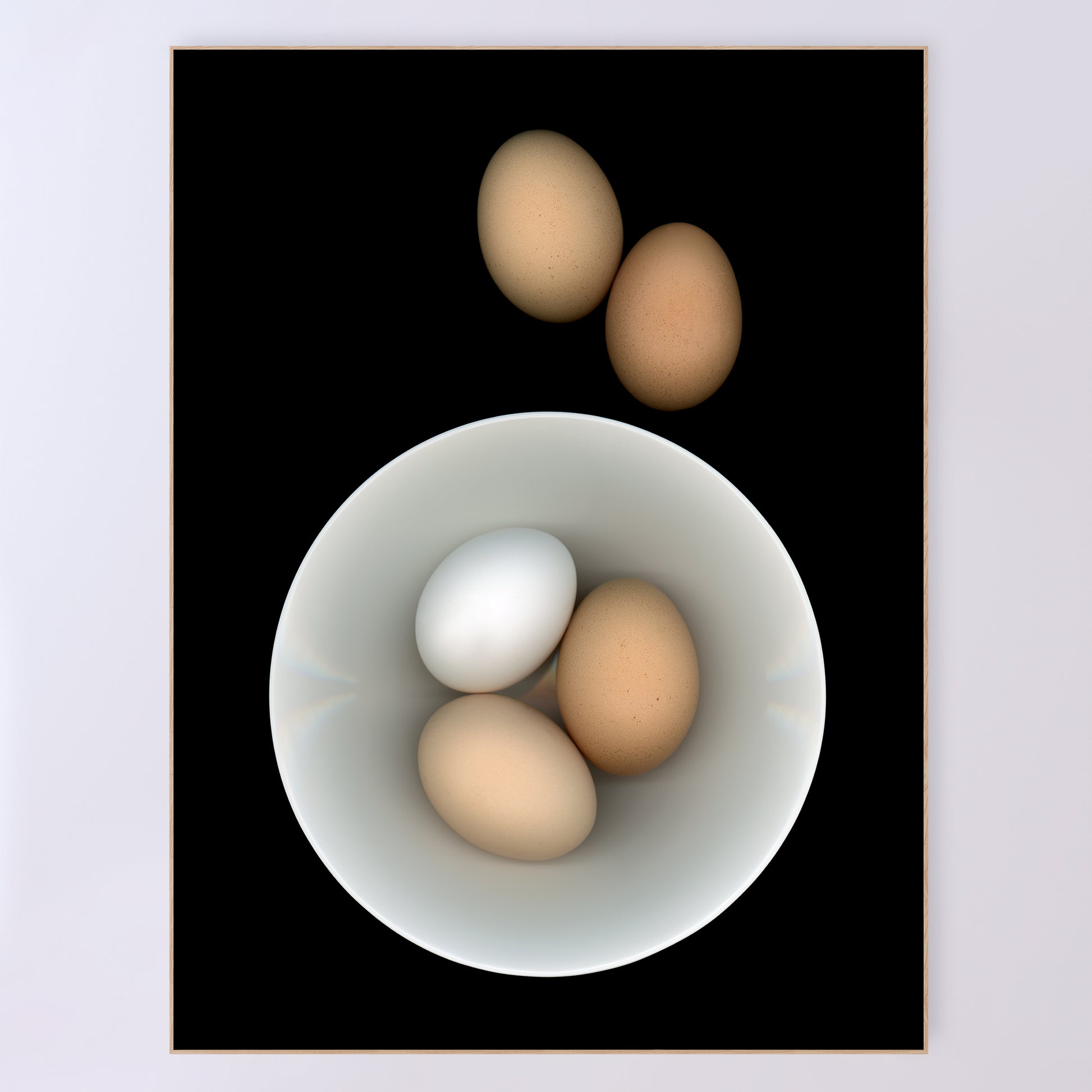 Breakfast anyone? Three eggs in a white bowl with two brown egg on the side on a black background. Open edition 36x48 inches print by Carmen Grenier. OE-353-5