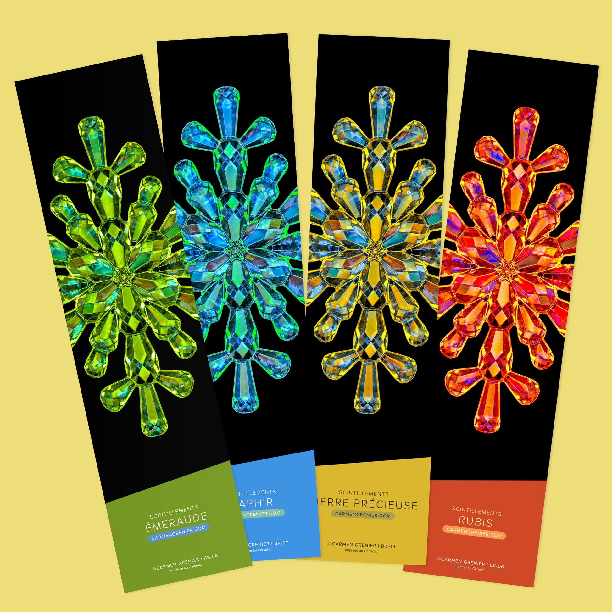 Set of four bookmarks from the Sparkles series on a yellow background. From left to right: the Émeraude, Saphir, Pierre précieuse and Rubis. SKU : BK-10